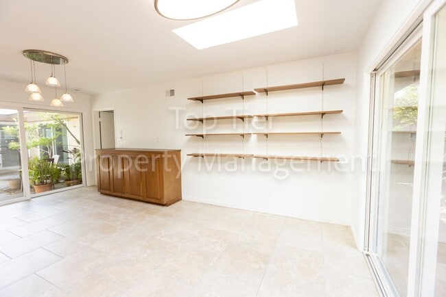 Building Photo - Charming Mid-Century Home | 4BR, 3BA | 2,4...
