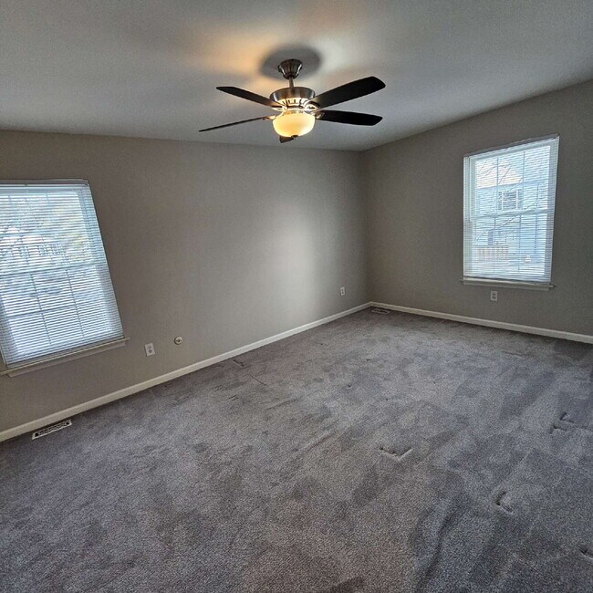 Building Photo - 2 Bedroom, 1.5 Bath Townhouse with Galley Kitchen & All Appliances, Open Living Area, Finished Ba...
