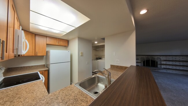 Kitchen, Washer and Dryer and Fireplace - 6125 NE 193rd Place