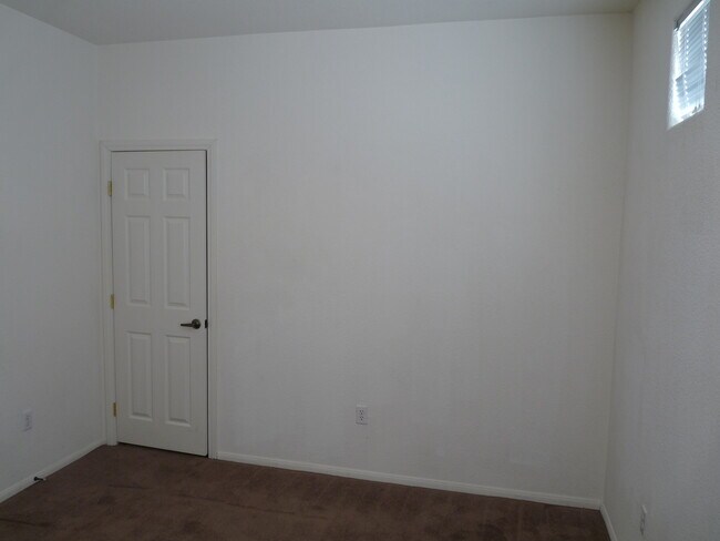 Building Photo - GATED 2 BEDROOM, 2 BATH CONDO IN JASMINE RANCH COMMUNITY