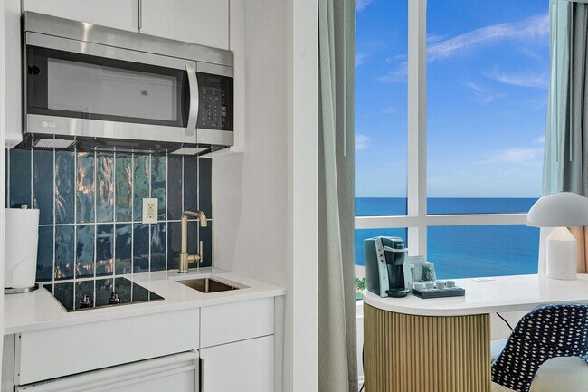 Building Photo - 4401 Collins Ave