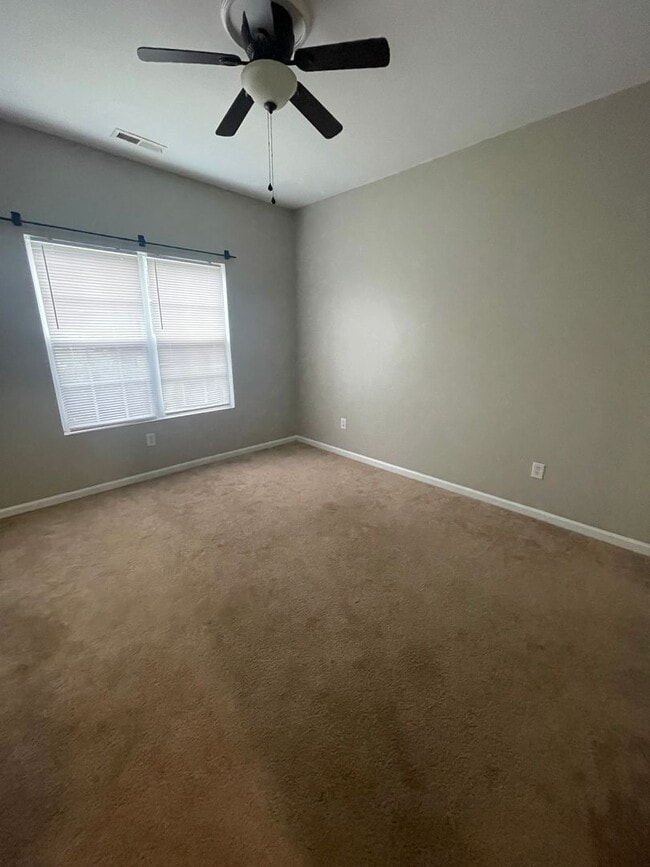 Building Photo - This two-story, 4-bedroom, 2-bath duplex in Fort Mill, SC sits on a corner lot