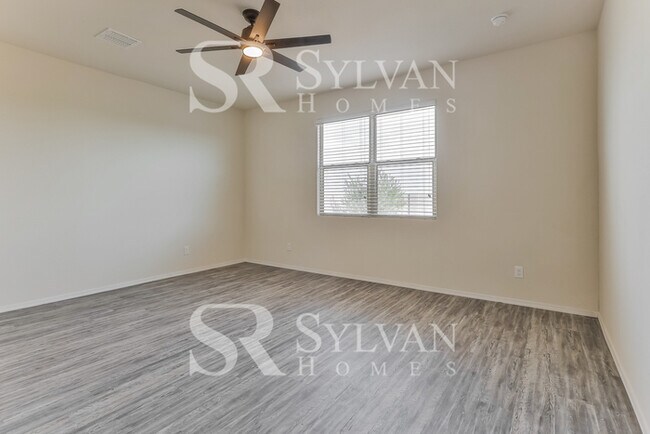 Building Photo - This charming home is ready for your personal touch!