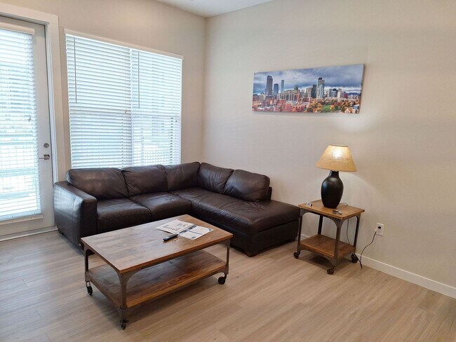 Building Photo - Your urban prairie sanctuary is here! One of a kind apartment homes where art, luxury & convenien...