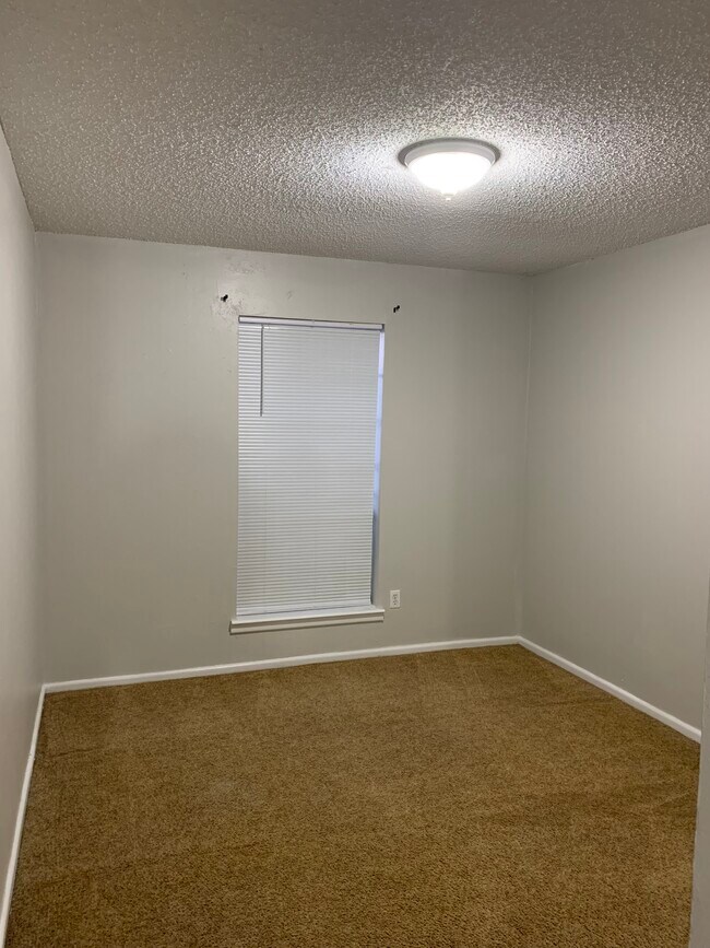 Building Photo - WoodCreek Apartments