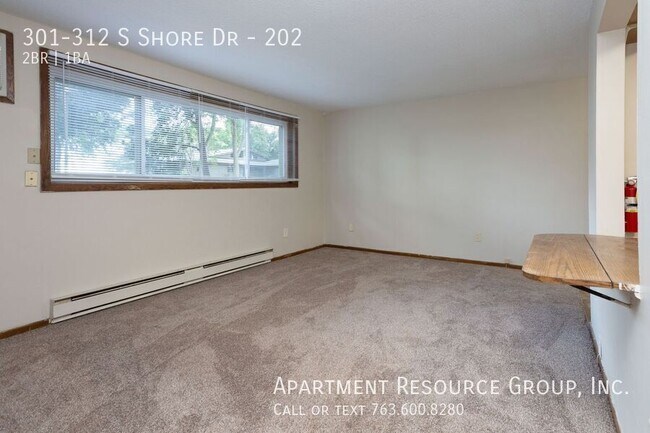Building Photo - 301-312 S Shore Dr-202