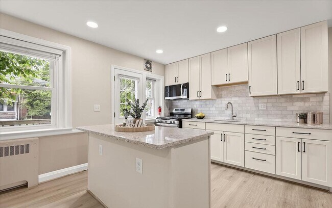 Building Photo - Updated 3BR Catonsville Townhome | Rear Parking + Deck