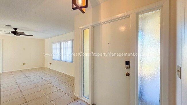 Building Photo - SPACIOUS SARASOTA HOME WITH LARGE FENCED YARD! MOVE IN READY! ALL TILE/ NEW LVP!
