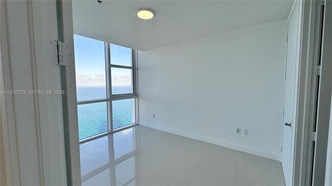 Building Photo - 18201 Collins Ave