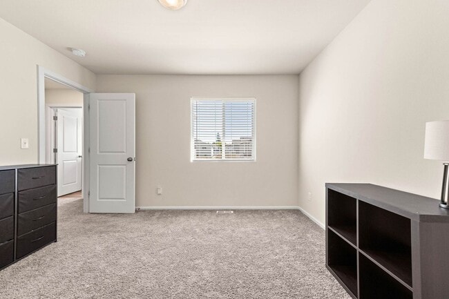 Building Photo - Spacious 3-Bedroom Home with Bonus Room, Main-Floor Den & Covered Patio Near JBLM