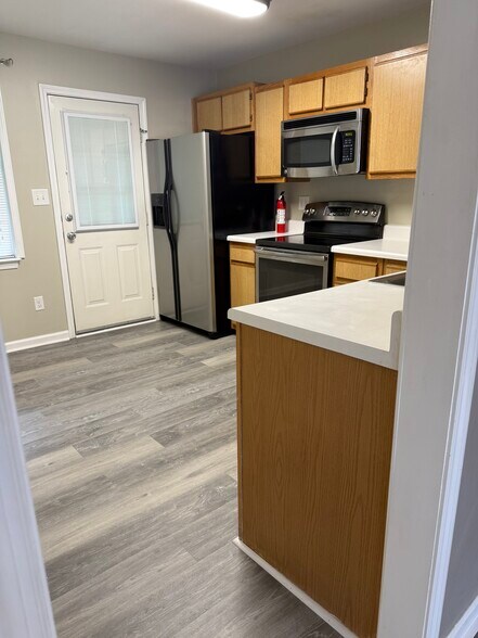 Kitchen with back door - 101 Davis St