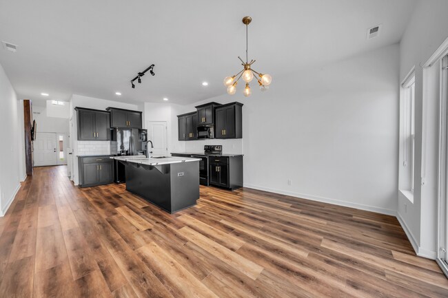 Building Photo - Modern Duplex with Spacious Design & Upsca...