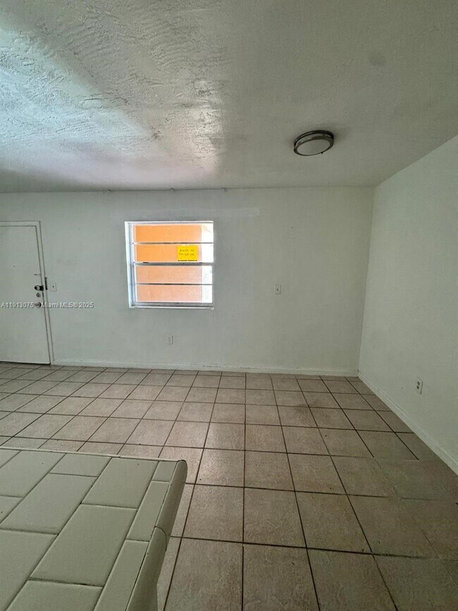 Building Photo - 1230 W 54th St