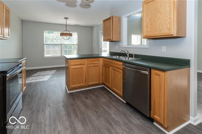 Building Photo - 9361 Eden Woods Ct