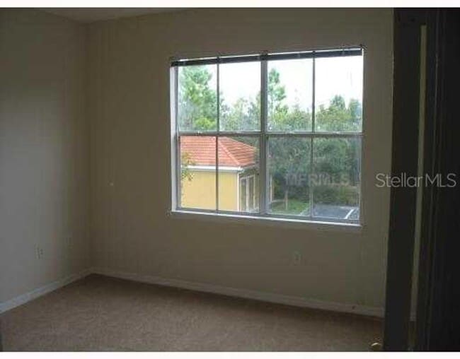 Building Photo - Very nice 2bed/1bath condo on 2nd floor in gated Enclave at Richmond place in New Tampa!