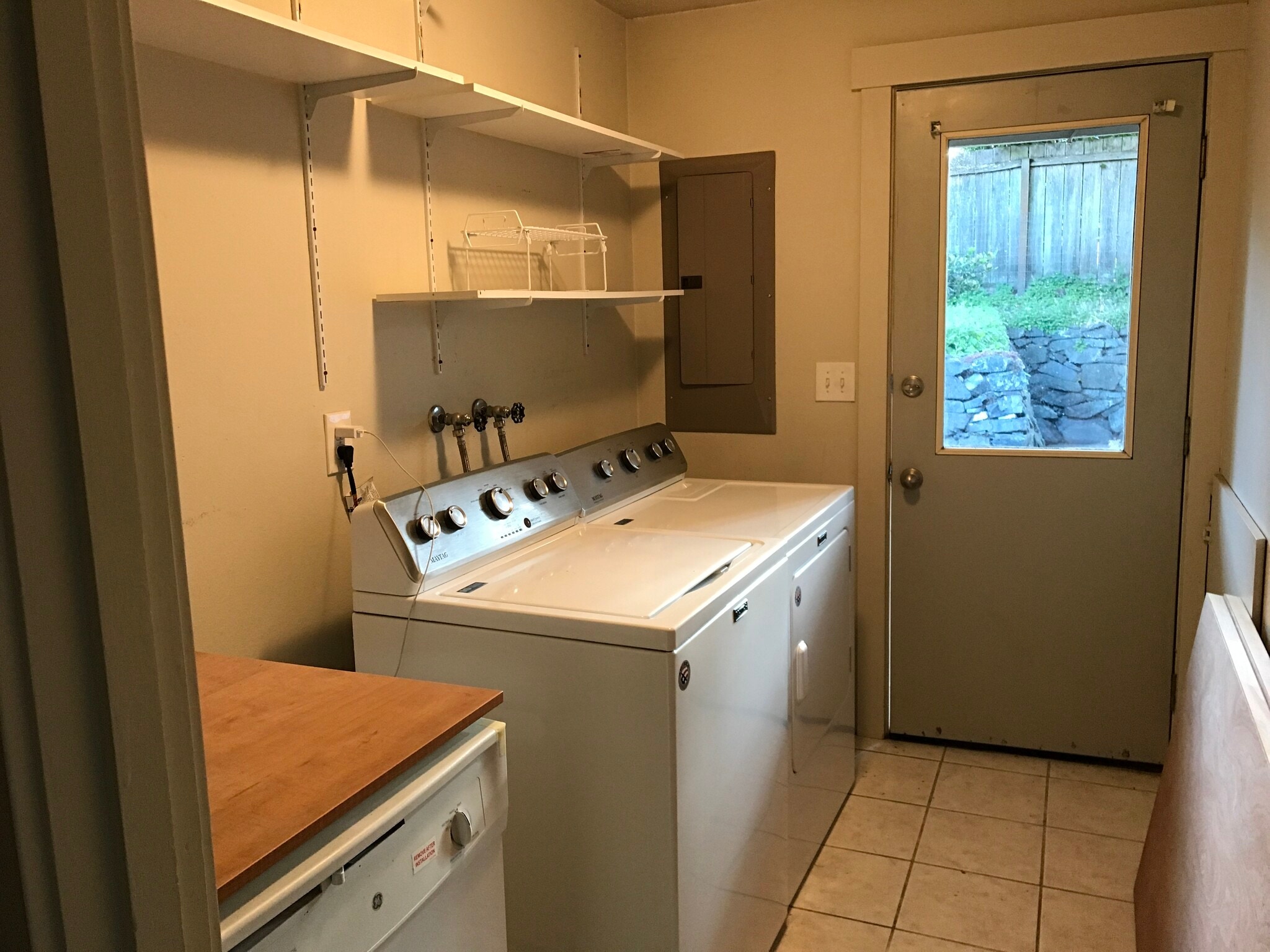 7834 Laundry and door to back yard - 7834 Custer Rd W