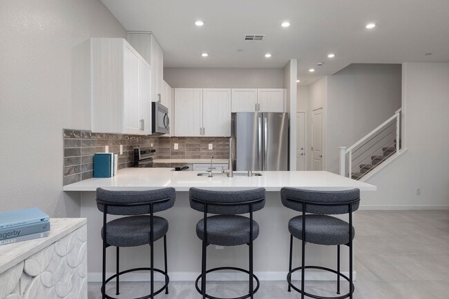 Building Photo - FULLY FURNISHED BRAND NEW TOWNHOME WITH 3 BEDROOMS + 2 CAR GARAGE