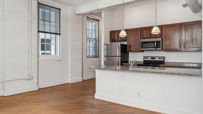 Building Photo - First Colony Flats