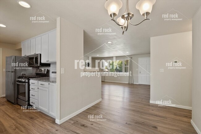 Building Photo - 2211 E 49th Ave