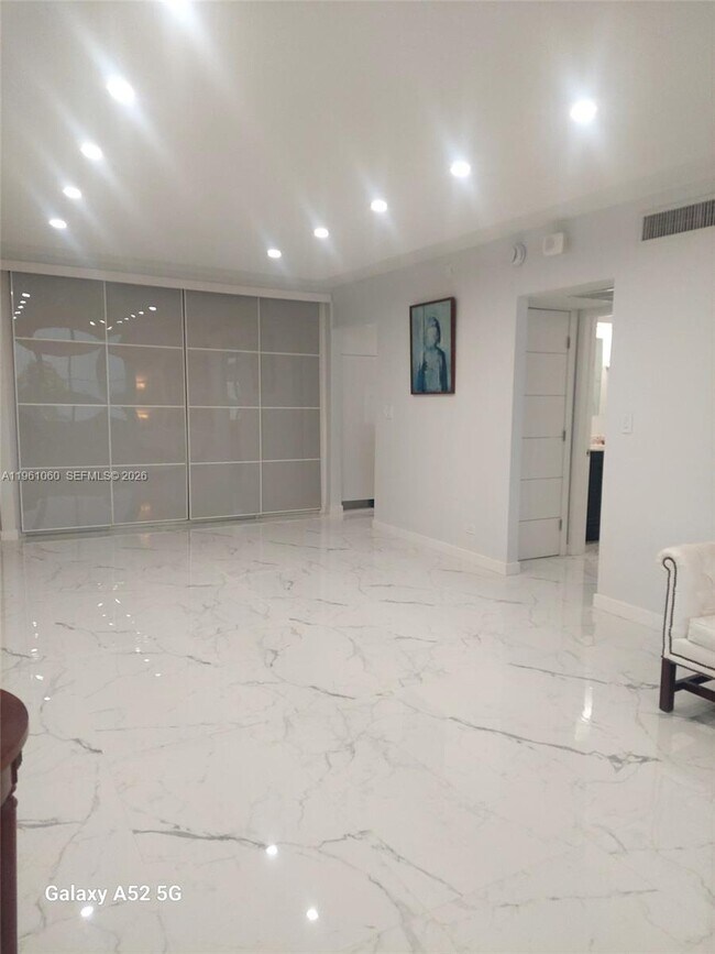 Building Photo - 5005 Collins Ave