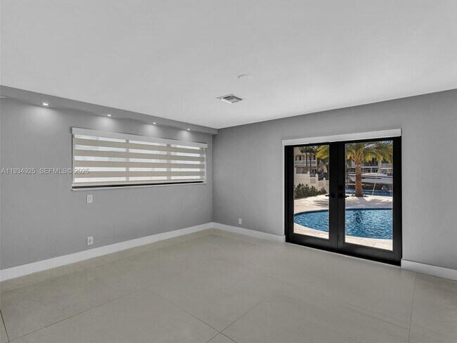 Building Photo - 2310 NE 48th Ct