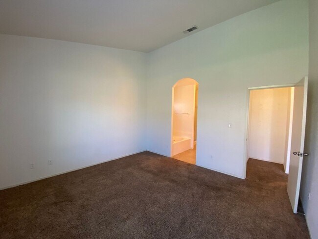 Building Photo - Large Corner Lot Home with Landscaping included!