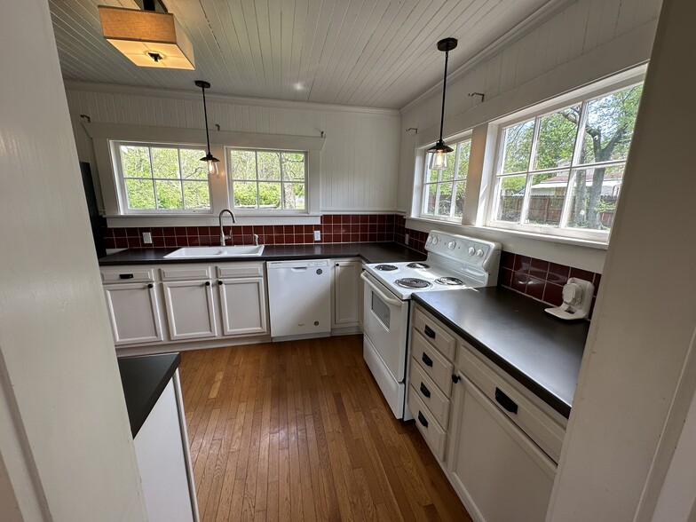The kitchen looks out onto the huge backyard - 1148 Pierce Rd