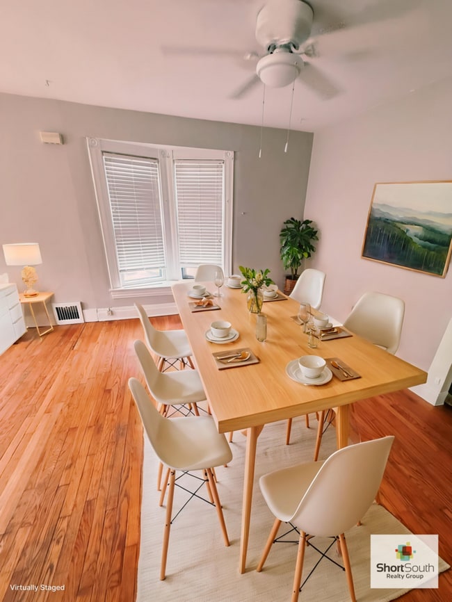 Building Photo - Updated 1 bed 1 bath upper unit townhome with basement and Laundry