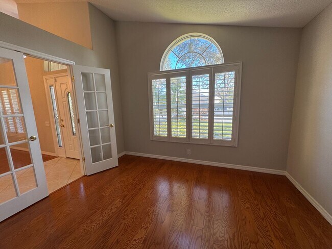 Building Photo - 4 Bedroom 2 Bathroom + Den - Attached Garage and  Heated  Pool!