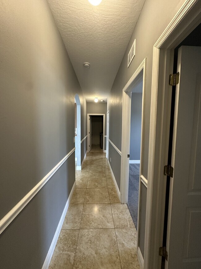 Building Photo - Spacious 4-Bedroom Home in Melbourne, FL w...