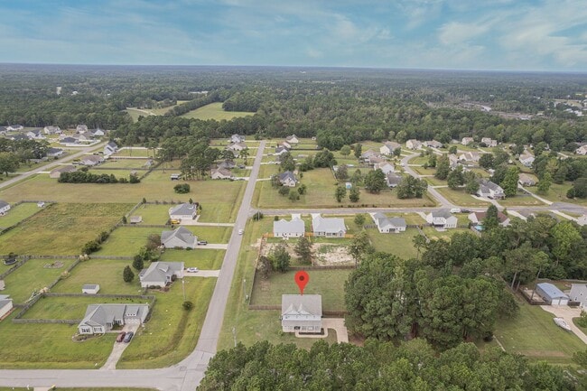 Building Photo - Coastal Elegance on a Spacious Corner Lot in Kings Harbor