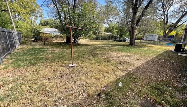 Building Photo - Welcome to Your Next Home with Harvest Investments!