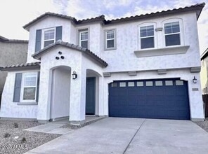 Building Photo - 8259 E Petunia Ave