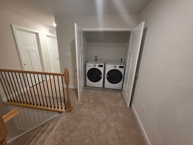 Building Photo - Luxury 4-Bedroom Townhome with Finished Walkout Basement & River Views