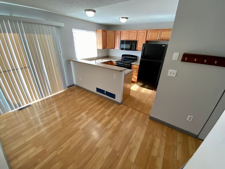 Building Photo - 9703 W Chatfield Ave