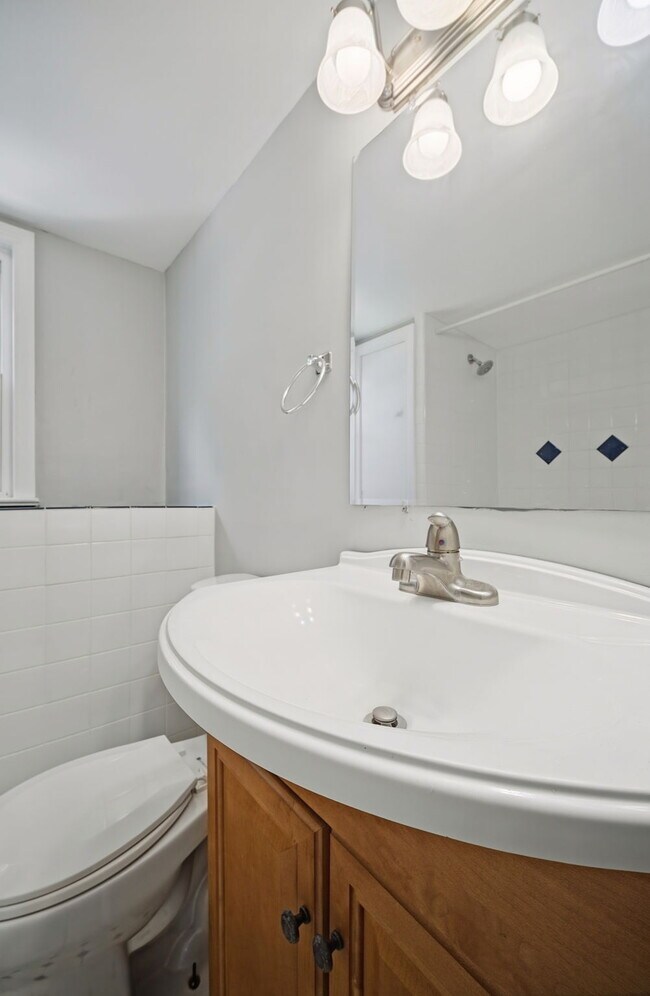 Building Photo - RARE FIND-4 BEDROOMS, 2 BATHROOMS, FENCED BACK YARD and GARAGE-PETS!!