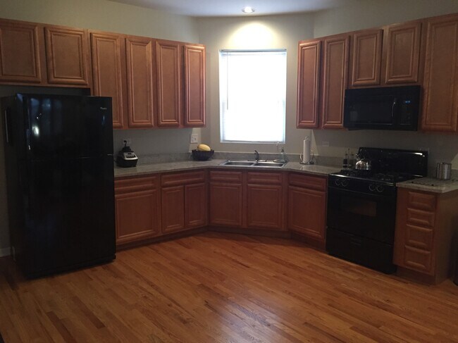 Building Photo - 2438 N Laramie Ave