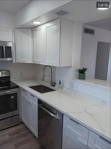 kitchen - 3050 N Palm Aire Dr