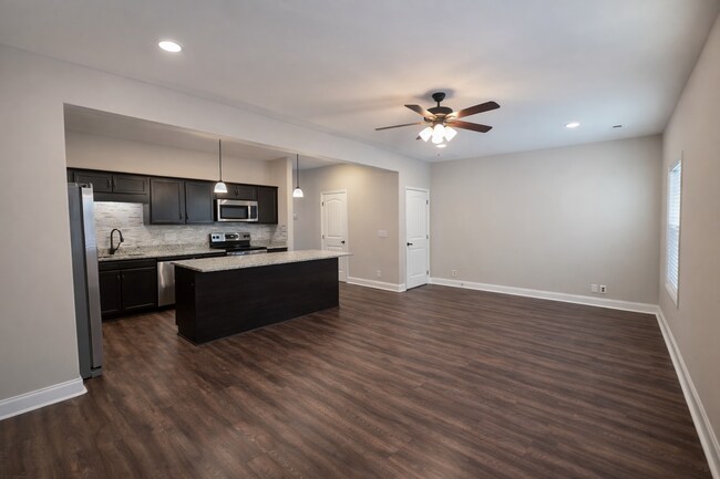 Building Photo - $250 OFF Move In Special! - Modern 3 Bedroom Townhome in Prime Location