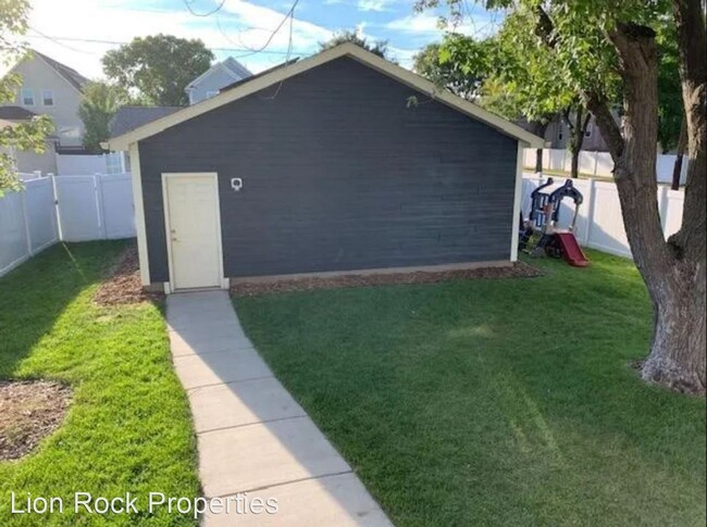 Building Photo - 4 br, 3.5 bath House - 5053 Girard Ave. N.