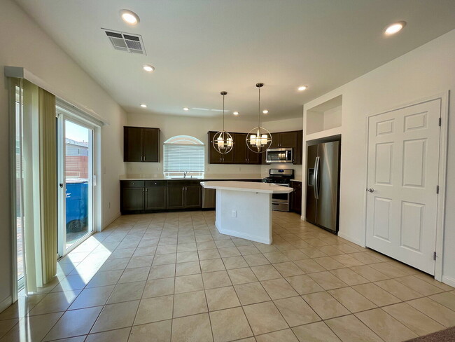 Building Photo - BEAUTIFUL 5 BED 3.5 BATH 3 FLOORS 2 CAR GARAGE SINGLE FAMILY HOME W/ LARGE LOFT & BACKYARD FOR RENT!