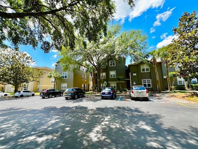 Building Photo - NEW-Remodeled bathroom & kitchen! NEW VINYL PLANK flooring & fresh paint! 2 bedroom 1 bath condo ...