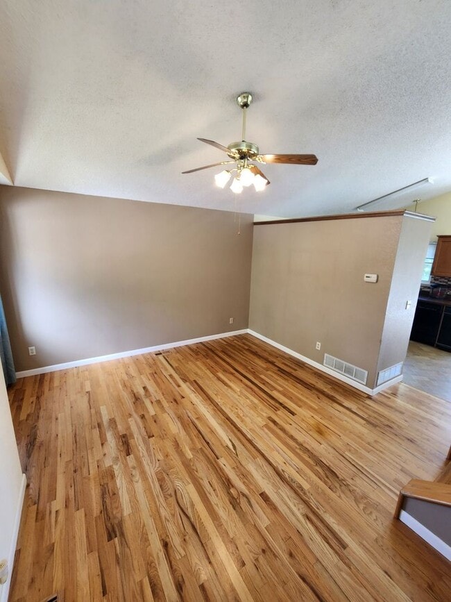 Building Photo - Spacious 4-Bedroom Home with RV Parking in...