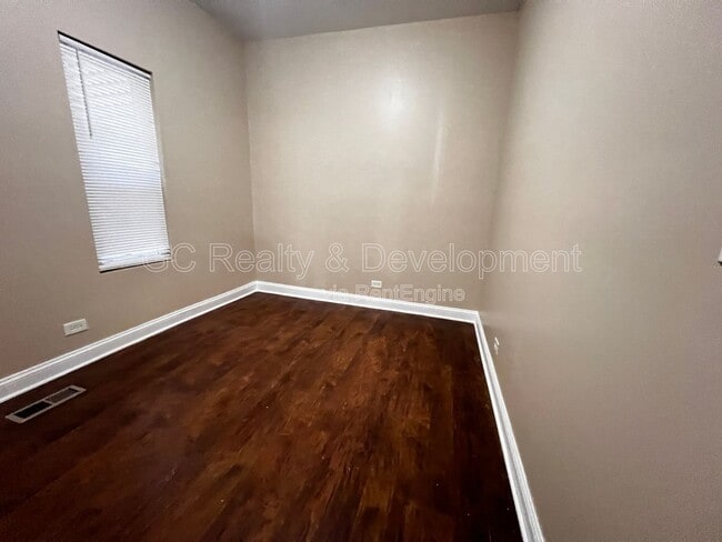 Building Photo - 7642 S Normal Ave