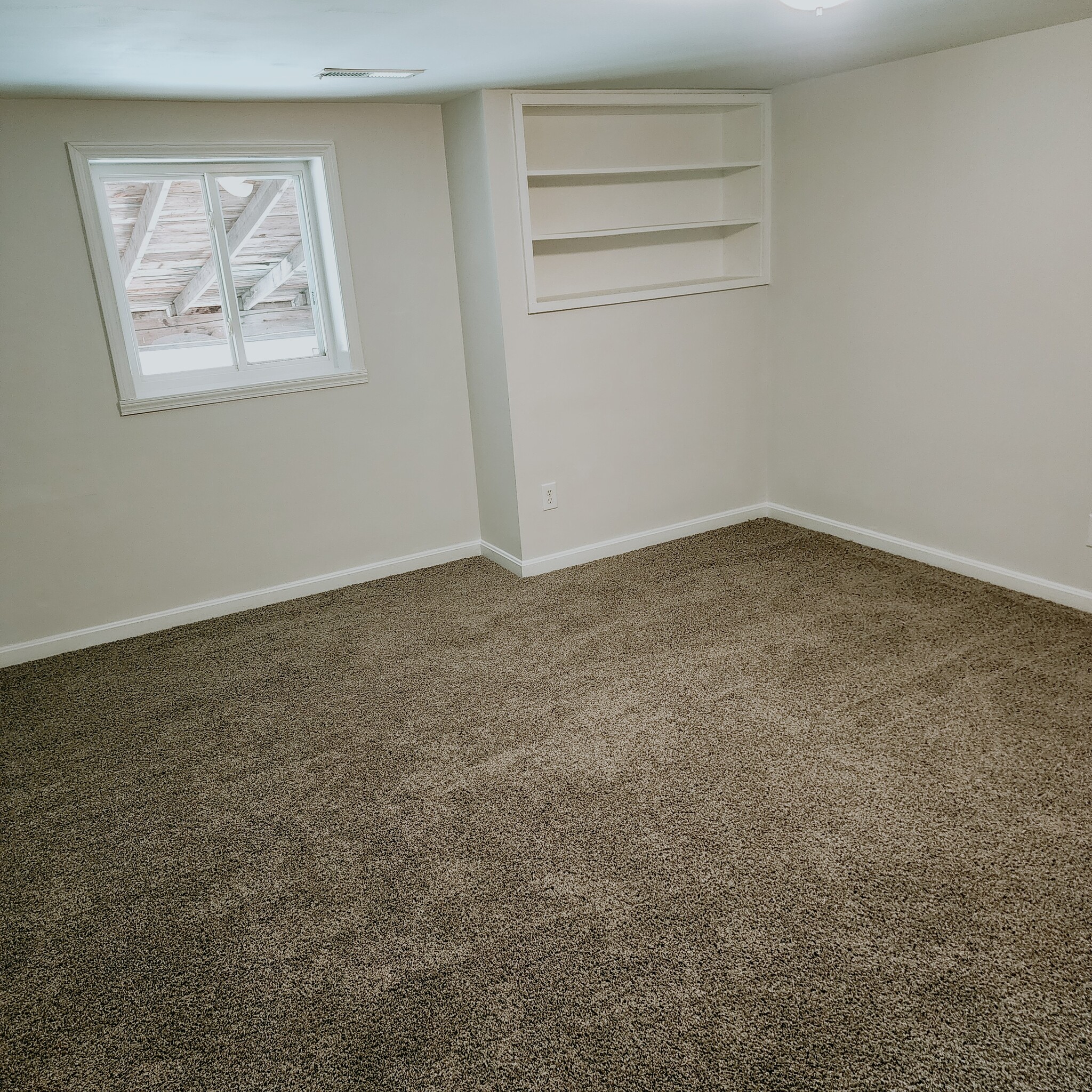 Bedroom #1 features a walk in closet and built-in shelves - 878 N Base Rd