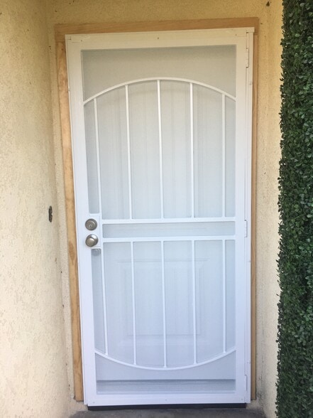 Front screen door - 126 N La Plaza