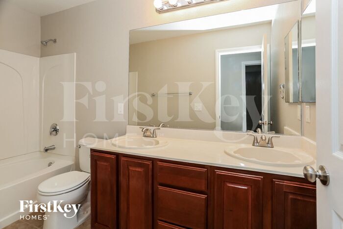 Building Photo - 5723 Breezy Wind Ct