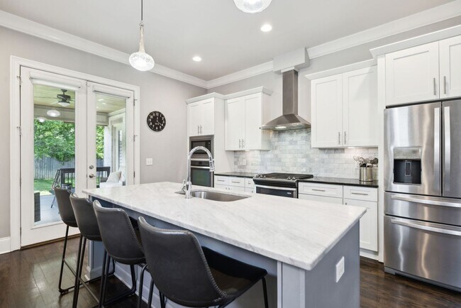 Building Photo - Welcome to this beautifully designed 4-bed...