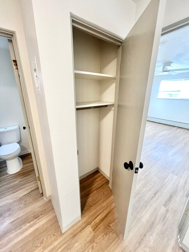 Explore the functionality of this inviting apartment with a smart use of space. - Harmony Apartments