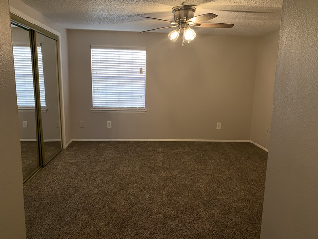 One Bedroom Townhome Upstairs Bedroom - Gulfwind Apartments